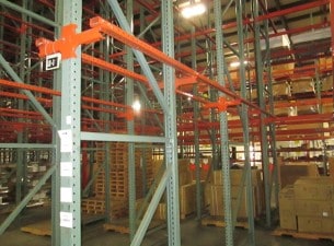 Used Interlake drive-in pallet rack frames and rails.