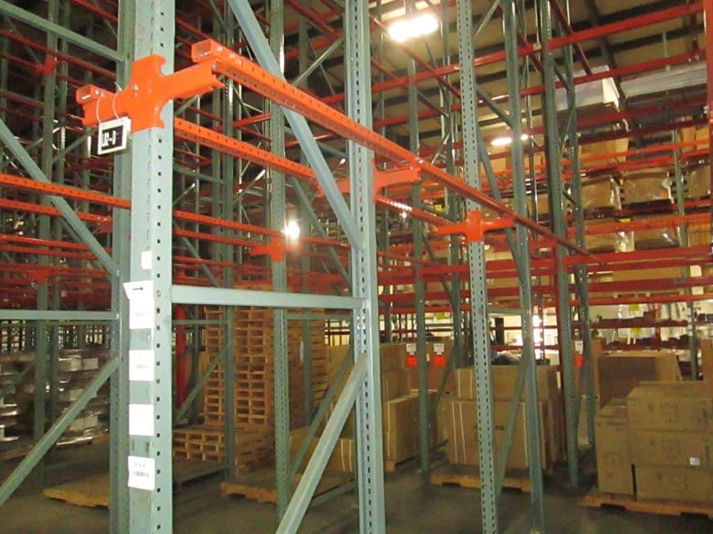 Used Interlake drive-in pallet rack frames and rails.