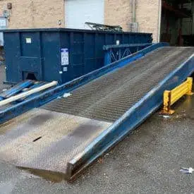 Used Bluff Manufacturing yard ramp shown at loading dock