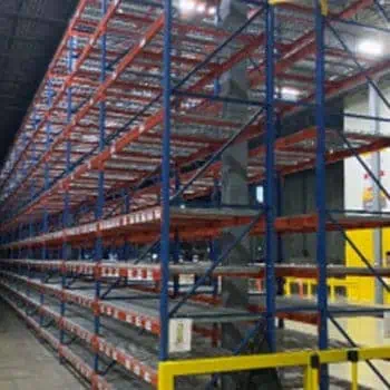 Frazier structural rack system standing in warehouse - 44" deep x 19'-6" frames and 99" structural beams.