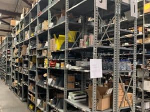 18" deep x 36" wide x 11'-6" clip-style shelving standing in warehouse